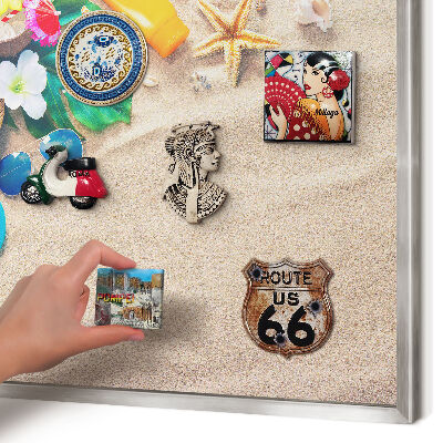 Souvenir magnet display board with a silver frame Summer relaxation
