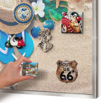 Souvenir magnet display board with a silver frame Summer relaxation