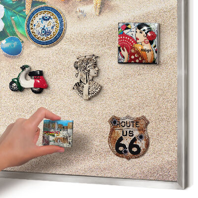 Souvenir magnet display board with a silver frame Summer relaxation