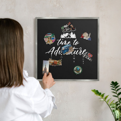 Printed magnet board in a silver frame Adventure awaits