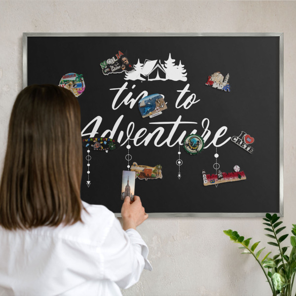 Printed magnet board in a silver frame Adventure awaits