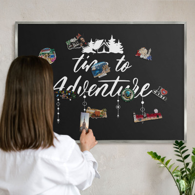 Printed magnet board in a silver frame Adventure awaits