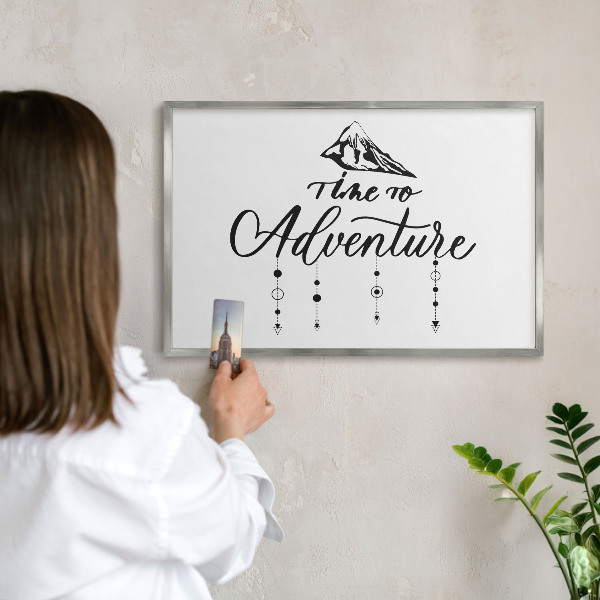 Souvenir magnet display board with a silver frame Mountain adventure