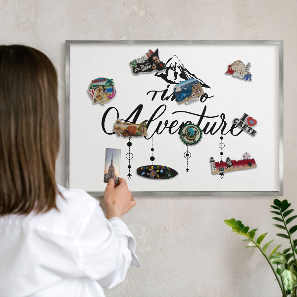 Souvenir magnet display board with a silver frame Mountain adventure