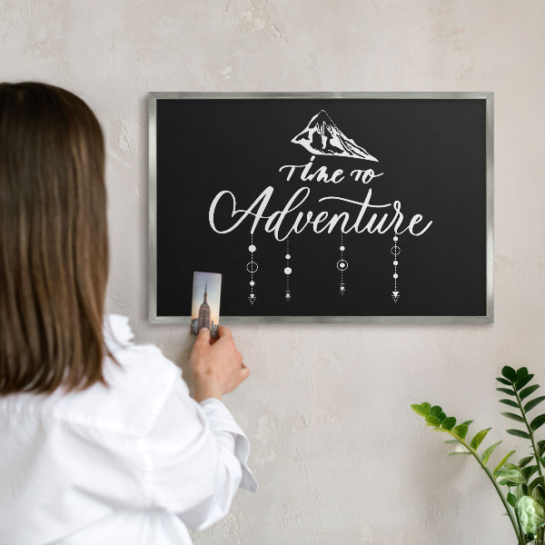 Printed magnet board in a silver frame Adventure awaits