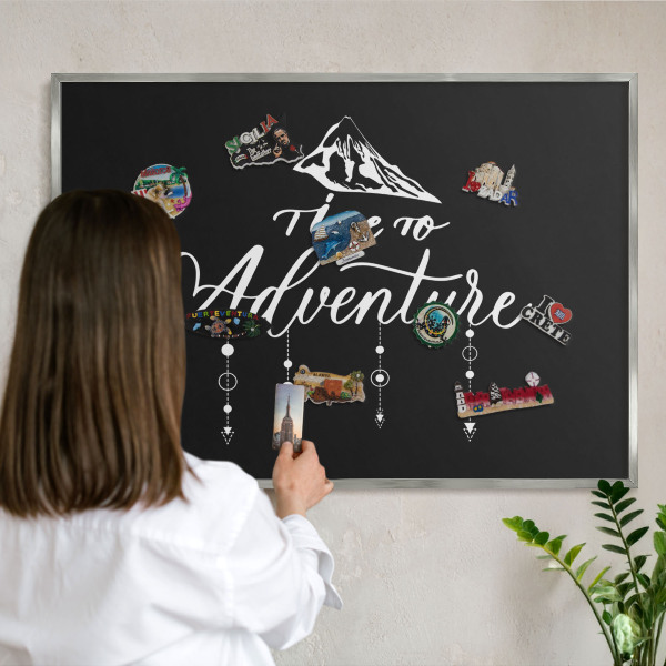 Printed magnet board in a silver frame Adventure awaits
