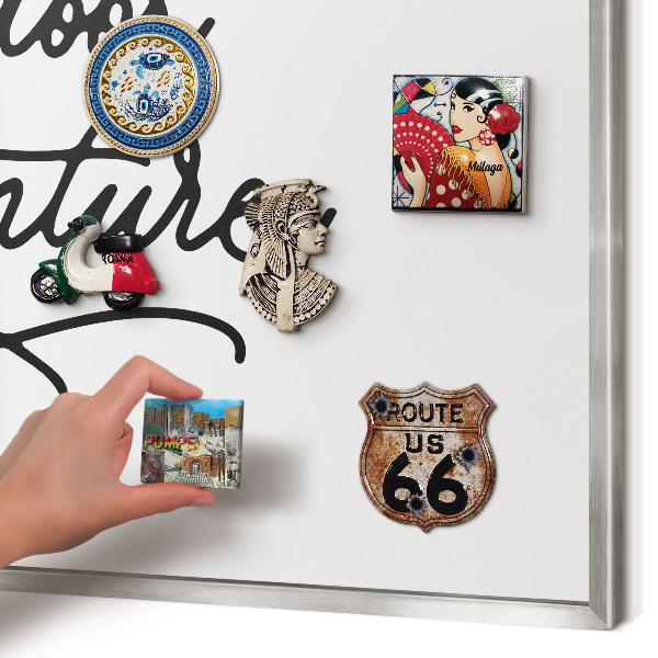 Souvenir magnet display board with a silver frame Mountain adventure