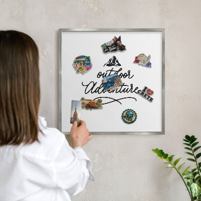 Souvenir magnet display board with a silver frame Mountain adventure
