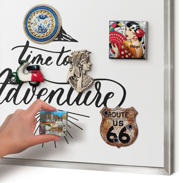 Souvenir magnet display board with a silver frame The Journey of Discovery