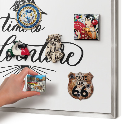Souvenir magnet display board with a silver frame The Journey of Discovery