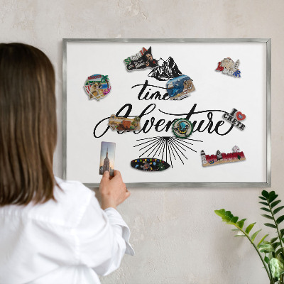 Souvenir magnet display board with a silver frame The Journey of Discovery