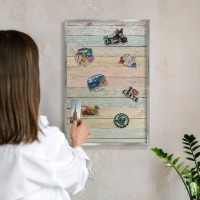 Souvenir magnet display board with a silver frame Rustic boards