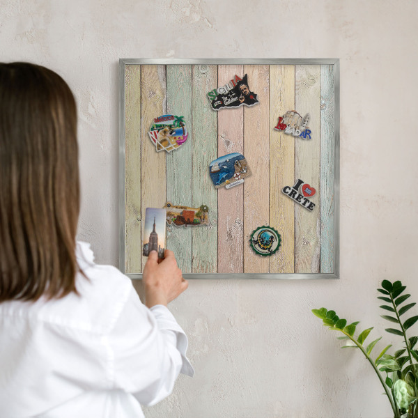 Souvenir magnet display board with a silver frame Rustic boards