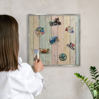 Souvenir magnet display board with a silver frame Rustic boards