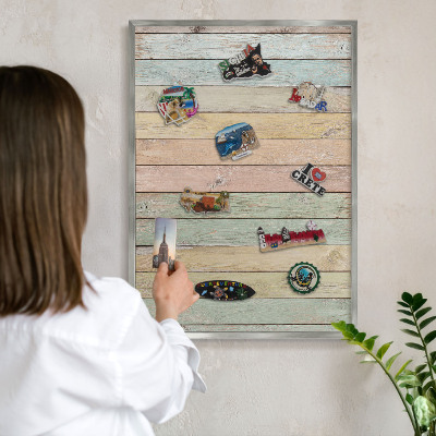 Souvenir magnet display board with a silver frame Rustic boards