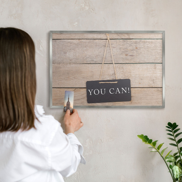 Souvenir magnet display board with a silver frame Motivation every day