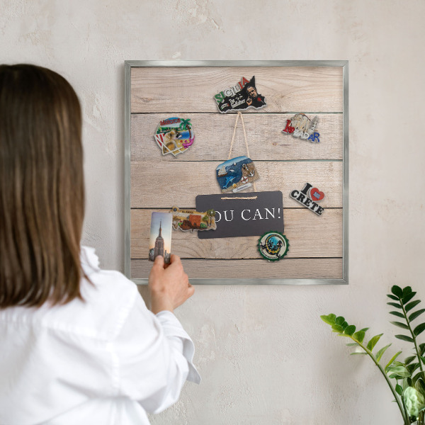 Souvenir magnet display board with a silver frame Motivation every day