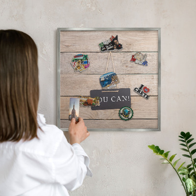 Souvenir magnet display board with a silver frame Motivation every day