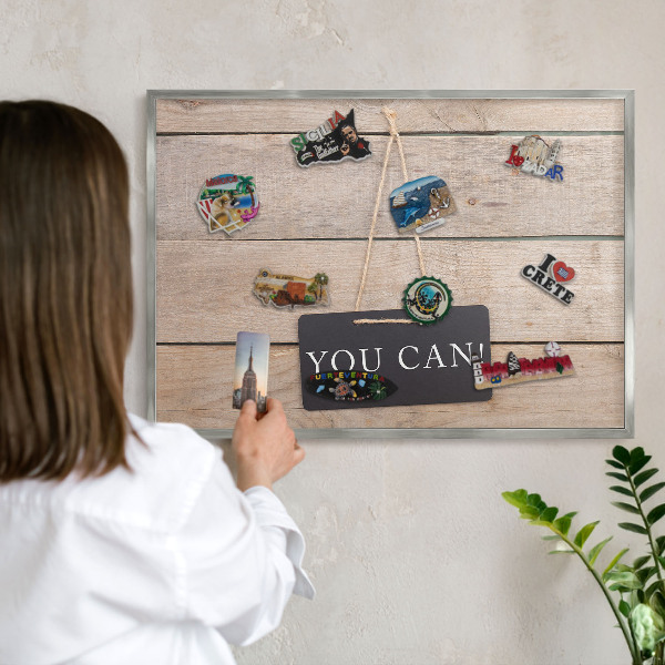 Souvenir magnet display board with a silver frame Motivation every day
