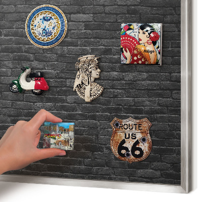 Souvenir magnet display board with a silver frame Brick wall