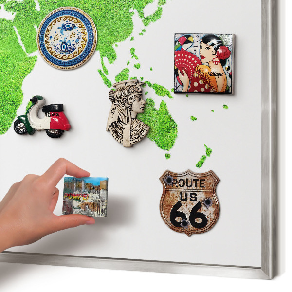 Souvenir magnet display board with a silver frame Green map