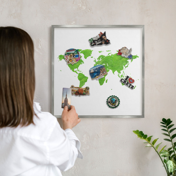 Souvenir magnet display board with a silver frame Green map