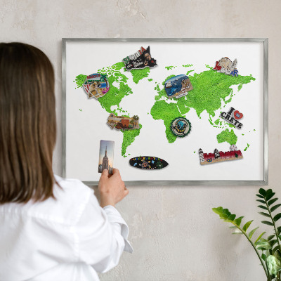 Souvenir magnet display board with a silver frame Green map