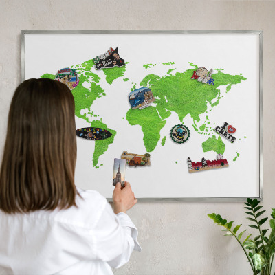 Souvenir magnet display board with a silver frame Green map