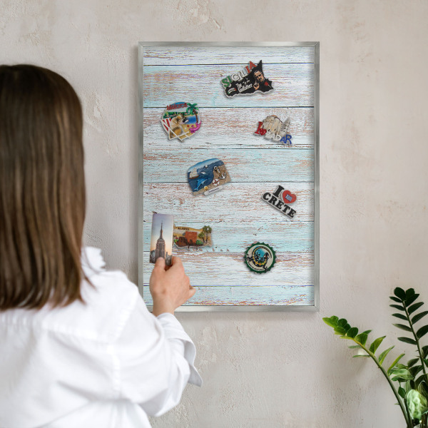 Souvenir magnet display board with a silver frame Rustic boards