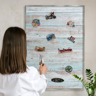 Souvenir magnet display board with a silver frame Rustic boards