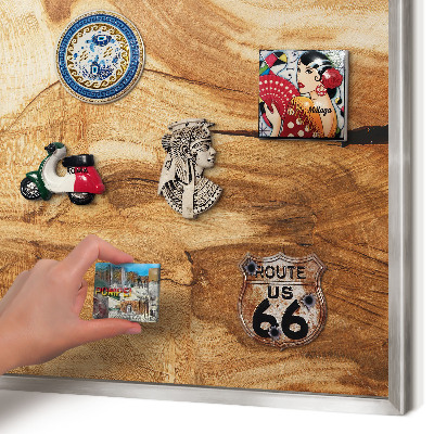 Souvenir magnet display board with a silver frame Natural wood