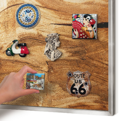 Souvenir magnet display board with a silver frame Natural wood