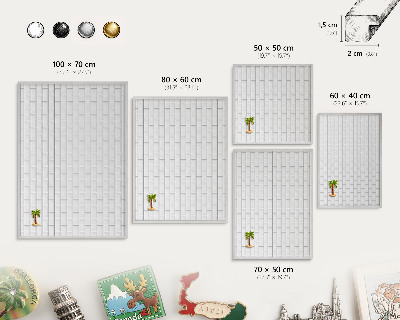 Souvenir magnet display board with a silver frame White bricks