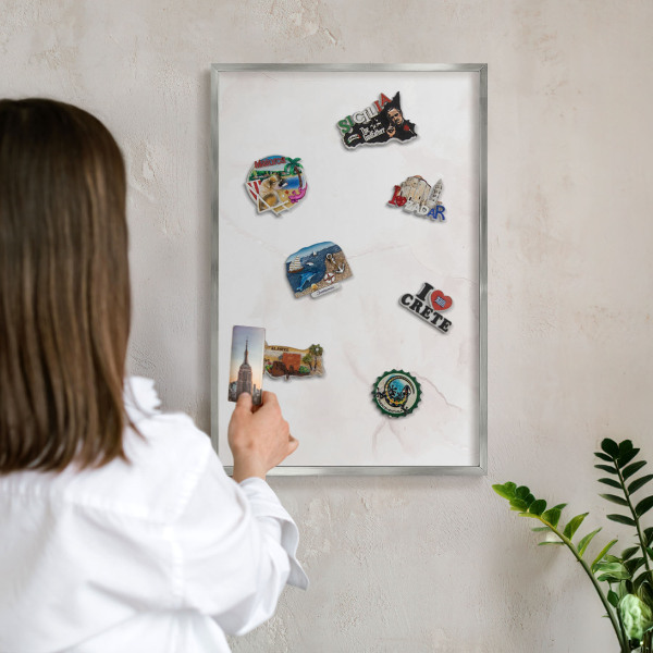 Souvenir magnet display board with a silver frame Marble elegance