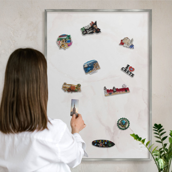 Souvenir magnet display board with a silver frame Marble elegance