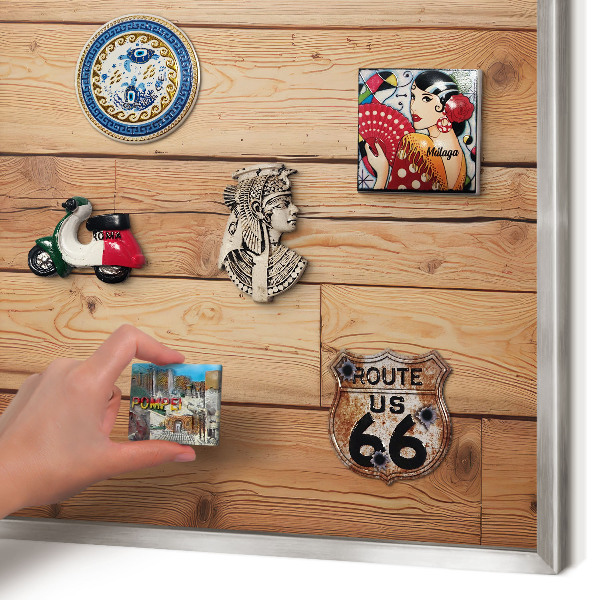 Souvenir magnet display board with a silver frame Wooden boards