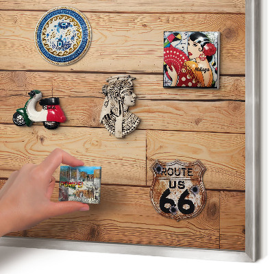 Souvenir magnet display board with a silver frame Wooden boards