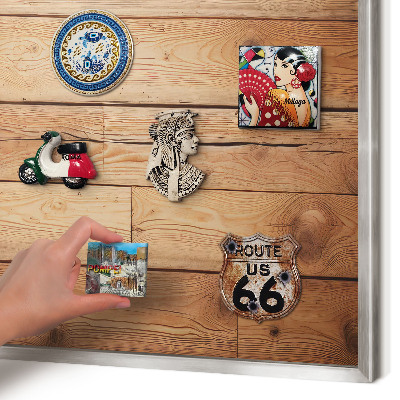 Souvenir magnet display board with a silver frame Wooden boards