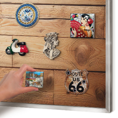 Souvenir magnet display board with a silver frame Wooden boards