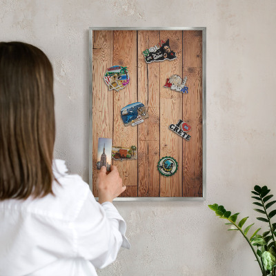 Souvenir magnet display board with a silver frame Wooden boards