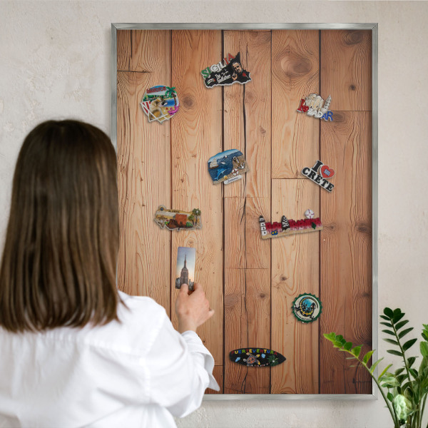 Souvenir magnet display board with a silver frame Wooden boards