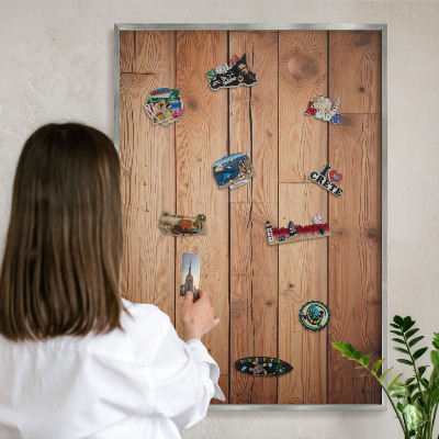 Souvenir magnet display board with a silver frame Wooden boards