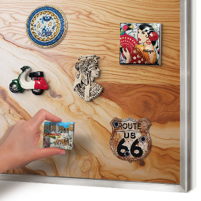Souvenir magnet display board with a silver frame Wooden texture