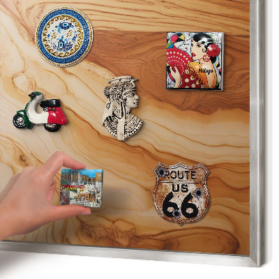 Souvenir magnet display board with a silver frame Wooden texture