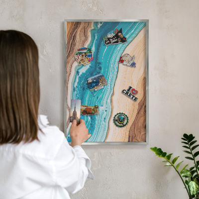 Souvenir magnet display board with a silver frame Earth's layers