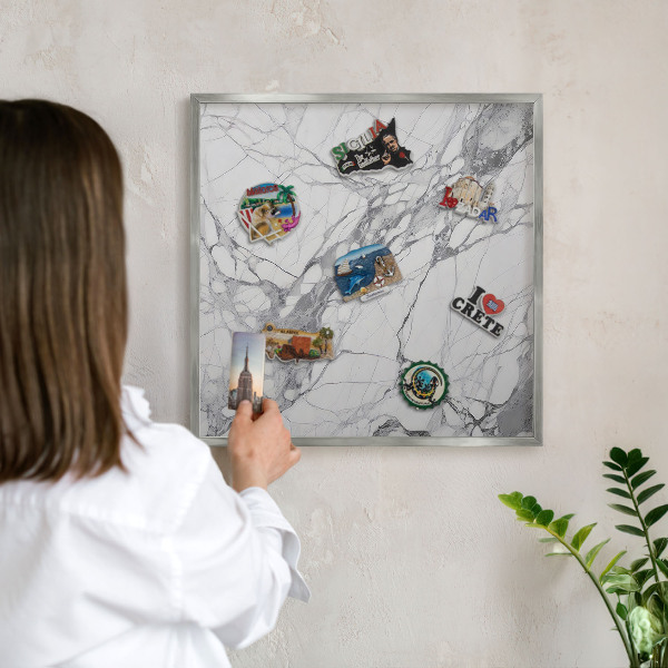 Souvenir magnet display board with a silver frame Marble elegance