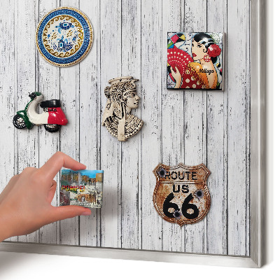Souvenir magnet display board with a silver frame Light wood