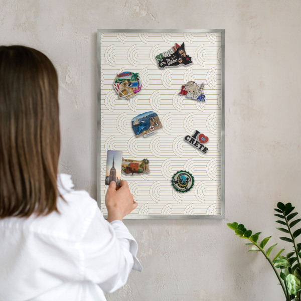 Souvenir magnet display board with a silver frame Artistic arches