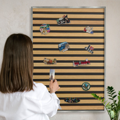 Souvenir magnet display board with a silver frame Wooden rhythms