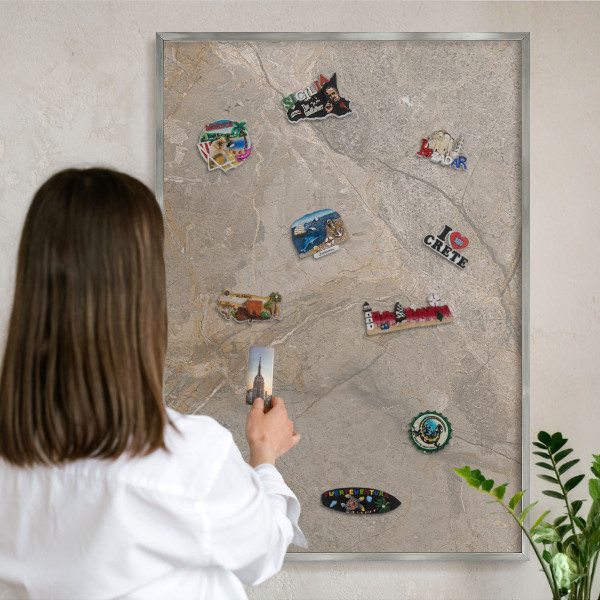 Souvenir magnet display board with a silver frame Beige stone